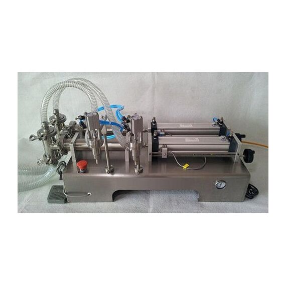 DOUBLE HEADED LIQUID PACKAGING MACHINE WITH 50-500 ML CAPACITY